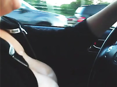 Chubby girl pulls out her boobs in the car