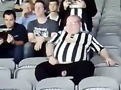 Fat football fan has his wiener revealed while watching a match